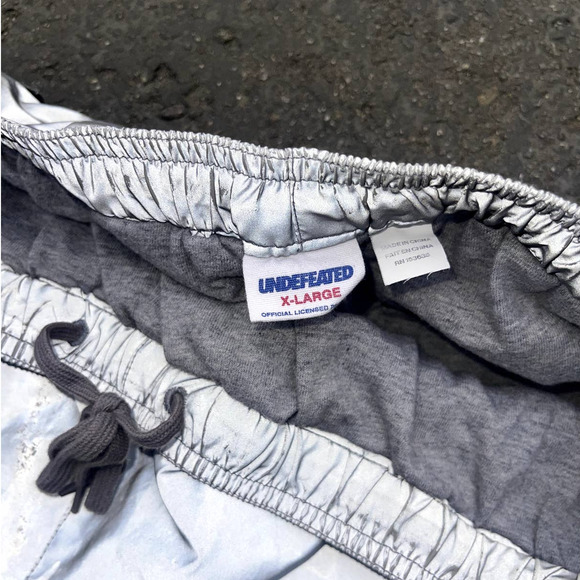 UNDEFEATED 3M Reflective Warm Up Track Pants - Picture 5 of 6